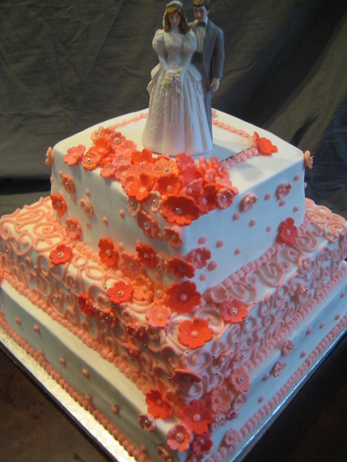 spanish style wedding cakes with red and white design