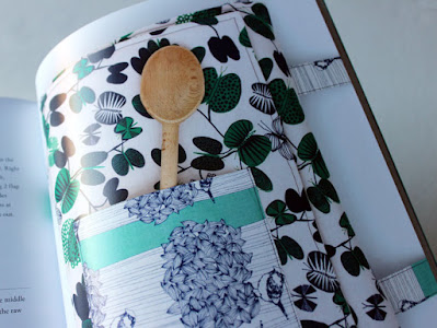 wooden spoon in a pocket on the potluck tote