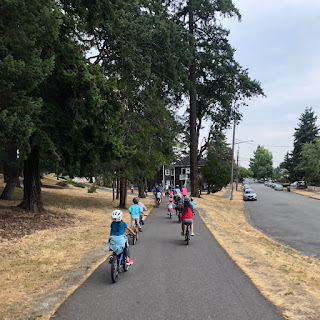 Kids Riding Bikes on the Flume Line Trail in Tacoma
