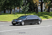 A limo passing inside the Kremlin (img )