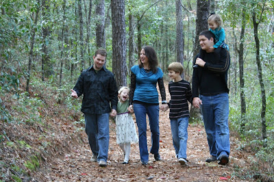 Lynd Family walking through the woods