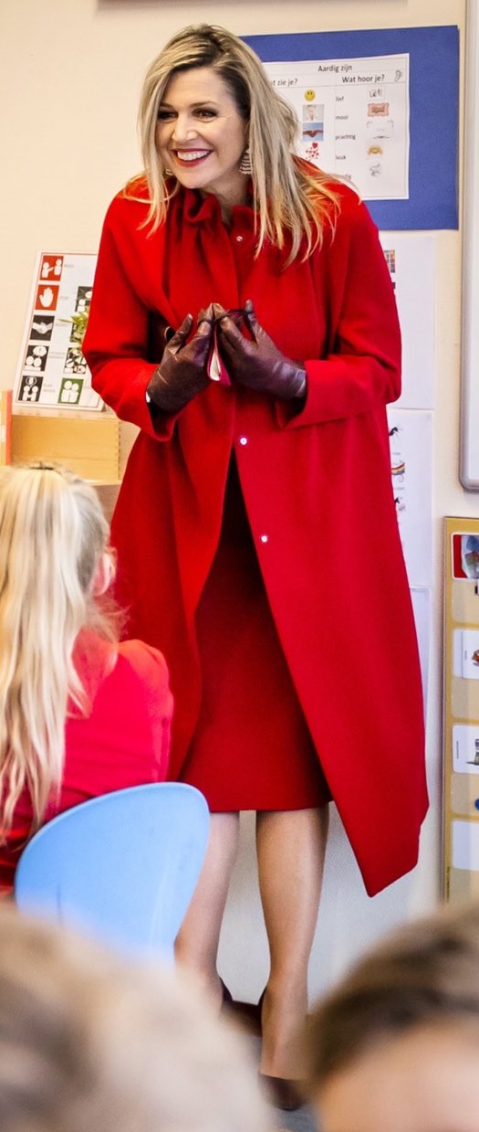 Queen Maxima of Netherlands in red Natan Coat for a school visit