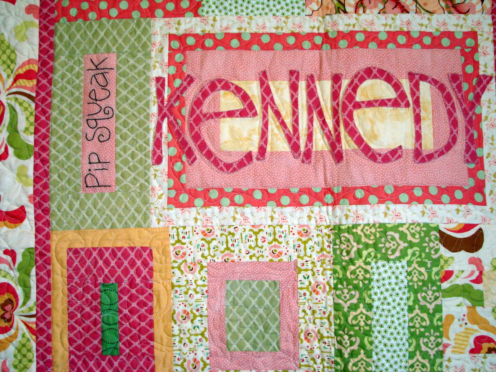 There A Lot Of Peek A Boo Embroidery On The Quilt