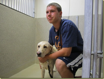 James and Reyna saying good bye in the kennel.