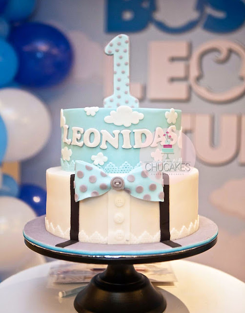 little man cake fondant chucakes 1st birthday bow clouds