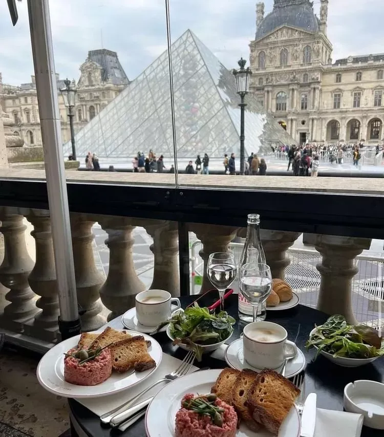 7- Café Marly Marly Coffee Shop is located on Tuileries Street, with a charming view of the Louvre Museum. Go to it during your visit to Paris to enjoy the most delicious French dishes.