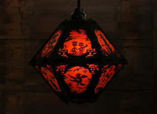 Another view of a paper Halloween lantern in the dark by Bindlegrim