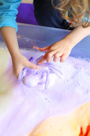 Magic Halloween Foaming Spiders - they shoot out rays of colored soap foam and disappear into a mound of fluffy colored foam, leaving baby spiders behind.  From Fun at Home with Kids