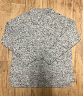 heather gray sweater with a half turtleneck and a boxy fit