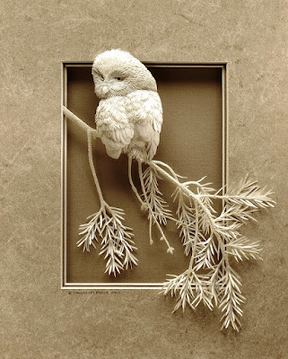 intricate wildlife paper sculpture 