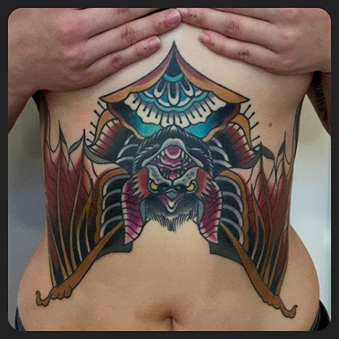 10 Bold Stomach and Sternum Bat Tattoos