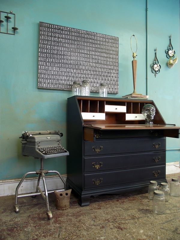 black dresser with gray drawers