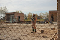An Iraqi soldier from the 2nd Battalion, 19th Brigade, 5th Division, pulls security at an abandoned school yard in Naqib. The Iraqi army is partnering with U.S. Forces to clear the villages of Naqib and Bey'a and disrupt al-Qaida networks and weapons caches in and around the Diyala province of Iraq, on Dec. 19