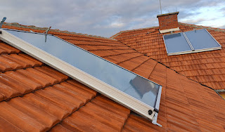 The panels on the roof; now waiting for boilers