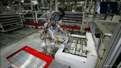 Bumble C was demonstrated picking components at Tesla's Freemont factory.