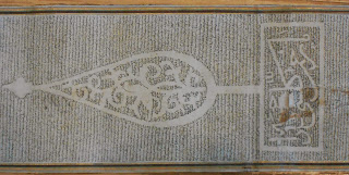 An image of an Arabic scroll from above.