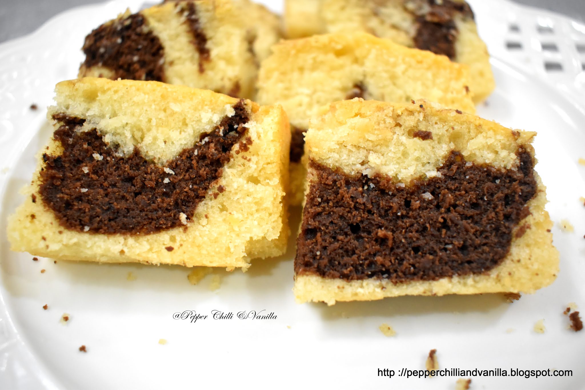 eggless hot milk marble cake ,eggless marble hot milk soonge