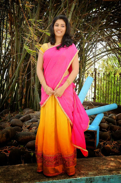 Malayalam actress Kruthika Jayakumar looks stunning in a half saree, showcasing timeless beauty and traditional elegance in the latest still.