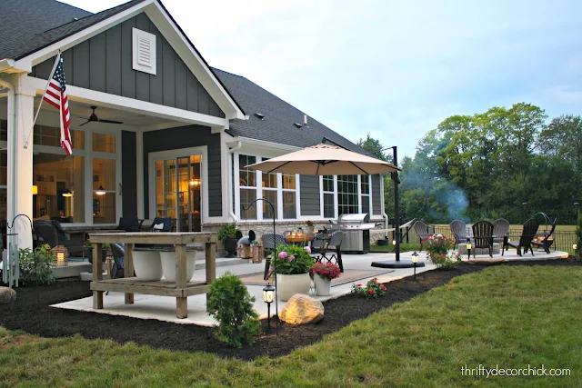 Dark gray Craftsman house patio fire pit 