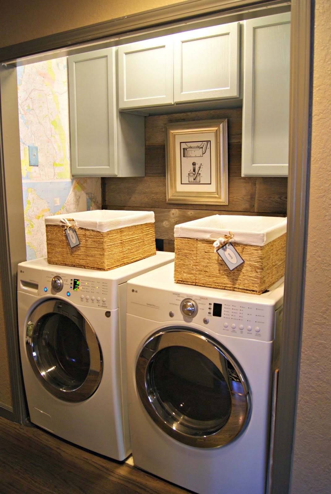 added a barnwood backsplash, cupboards for storage and map wallpaper ...