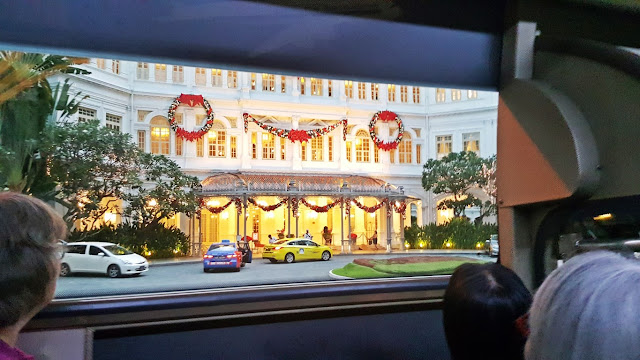 adorned in Christmas Lights, the main entrance of Raffles Hotel Singapore