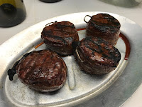 Resting steaks after grilling on Big Green Egg