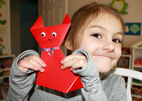 Tessa blinged up her origami cat with supplies from her craft kit.