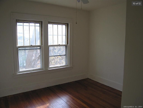 bedroom in yellow house for sale at 70 Crescent Street, Winsted, CT