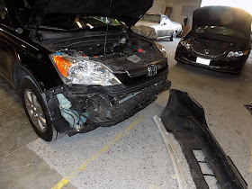Collision Damage on Honda CR-V before repairs at Almost Everything Auto Body
