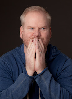 "File:Jim Gaffigan making a goofy excited face, Jan 2014, NYC (cropped).jpg" by Alan Gastelum is licensed under CC SA 1.0