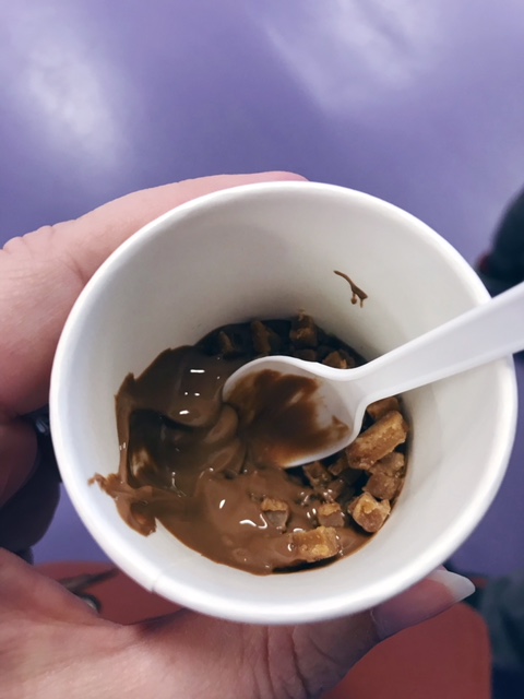 Melted chocolate in a small pot with fudge pieces