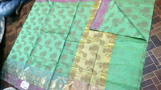 thread work buta with checks and zari border saree