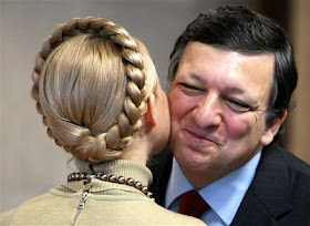 EU Commission President Jose Manuel Barroso kisses Ukraine's Prime Minister Yulia Tymoshenko goodbye after a meeting at the EU Commission headquarters in Brussels, Monday Jan. 28, 2008. (AP Photo/Geert Vanden Wijngaert)