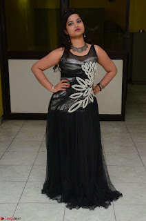 Shrisha Dasari in Sleeveless Short Black Dress At Follow Follow U Audio Launch 023.JPG