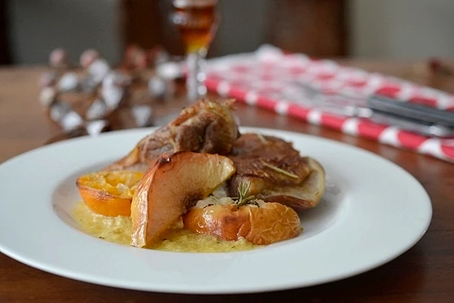 Cordero asado con membrillo y mandarinas