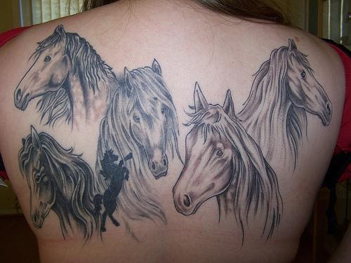 Five horse back piece tattoo.