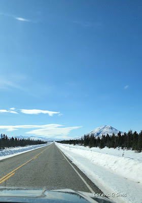 Beautiful mountain, long road, snow, blue sky