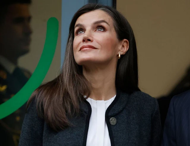 Queen Letizia wore a new Austriaca Manet cashmere jacket by Frambua, and Banora silk blouse by Hugo Boss