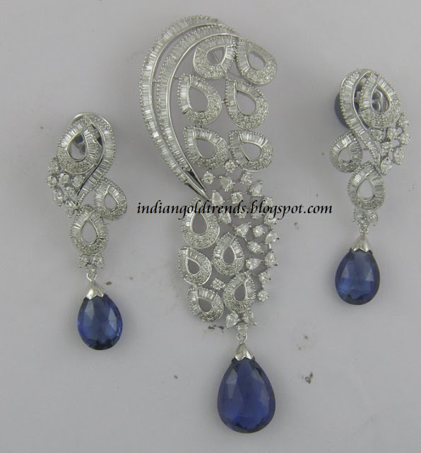 ... diamond pendant with blue sapphire drop paired with white gold diamond