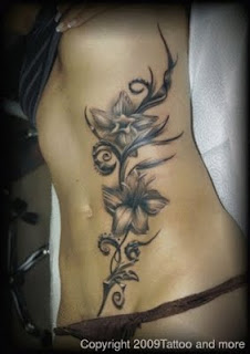 Black and Grey Ink Flower Tattoo on Sexy Girl Sidebody