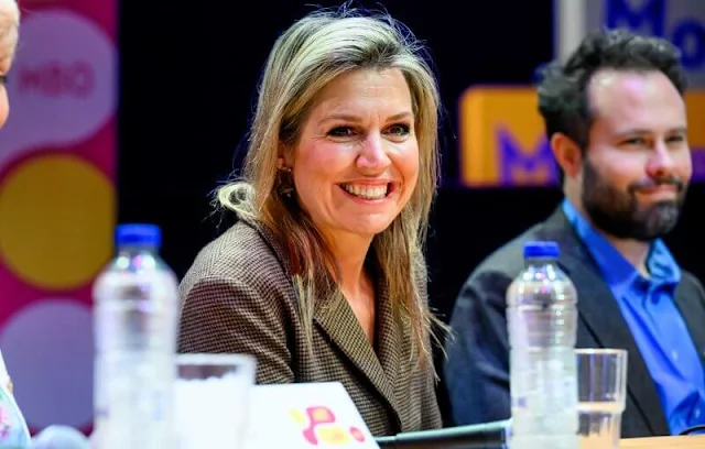 Natan houndstooth wool jacket. Queen Maxima wore a houndstooth wool jacket and wool skirt by Natan. Art Camp vocational education