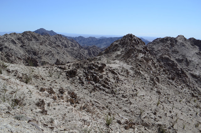 wide ridge with trail along it