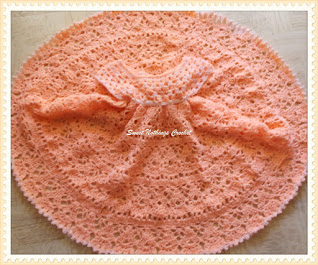 an awesome baby dress - free crochet pattern info from Sweet Nothings Crochet