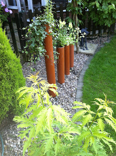 tube pipe used for gardening feature