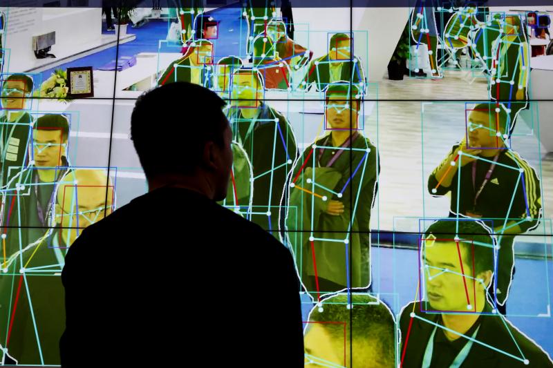 AI-powered human motion analysis software on display at a public security exhibition in Beijing, October 2018 Thomas Peter / Reuters