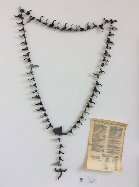 recycled used gun trigger rosary stefanie Girard art