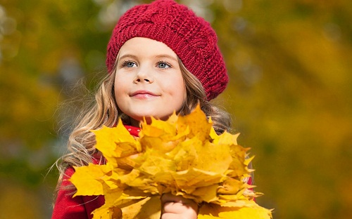 Baby Girl with Beautiful Yellow Flowers