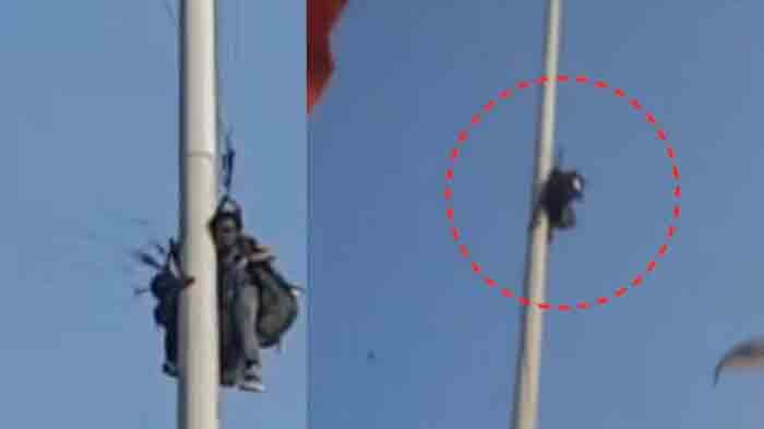 Man and woman who got stuck in high mast light while paragliding rescued, Thiruvananthapuram, News, Accident, Trapped, Kerala
