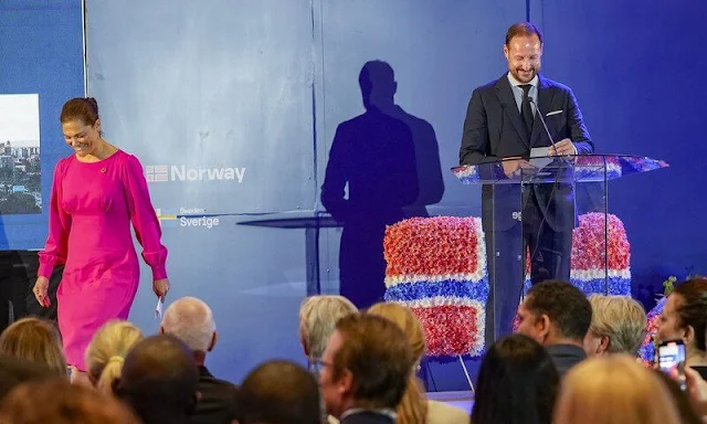 Crown Princess Victoria wore a new pespoke pink Lucia crepe dress by Swedish designer Camilla Thulin. By Malina Aimee dress