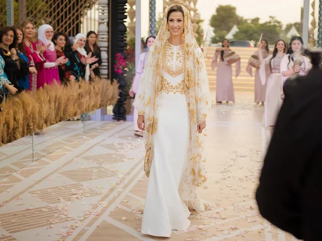 Princess Rajwa Al-Saif wore a white and gold dress by Saudi designer Honayda Serafi. Princess Iman and Princess Salma